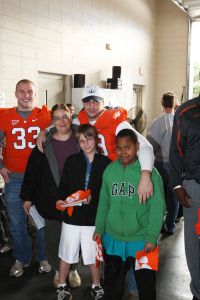 Members of the Clemson football team spent the morning of Monday, December 20 volunteering at Harvest Hope Food Bank in Greenville.