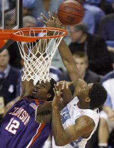 Raymond Sykes and North Carolina's Alex Stepheson fight for a rebound. (AP Photo/Rick Havner)