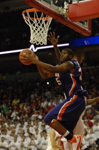 Trevor Booker scoops in a reverse layup (Photo by Zach Hanby)