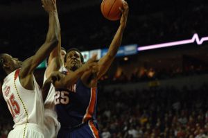 Cliff Hammonds drives against James Gist (Photo by Zach Hanby)
