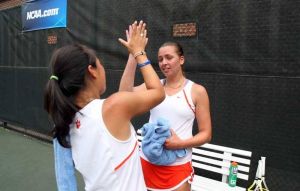 laurianne henry and keri wong celebrate high five