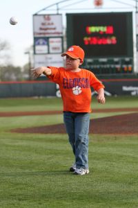 Kid throwing out pitch