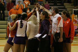 team huddle postgame with coaches
