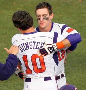 Jon McGibbon is congratulated by teammate Mike Dunster following his game-winning walkoff home run against Florida State on Friday in the 2012 ACC Tournament.