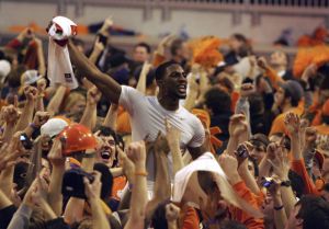 Clemson's Demontez Stitt, center, celebrates after Clemson's 83-64 win over North Carolina in an NCAA college basketball game Wednesday, Jan. 13, 2010, in Clemson, S.C. (AP Photo/Mary Ann Chastain)