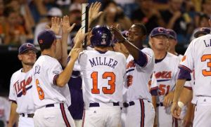 team celebrate run score