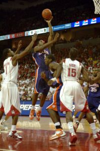 KC Rivers drives through the lane (Photo by Zach Hanby)