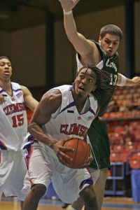 Clemson's Raymond Sykes prepares to shoot as Mayaguez' Diego Garcia goes blocks from behind in a San Juan Shoot Out basketball tournament game in Guaynabo, Puerto Rico, Thursday, Dec. 20, 2007. (AP Photo/Brennan Linsley)