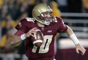 Boston College quarterback Chris Crane scrambles with the ball behind the line of scrimmage in the fourth quarter.