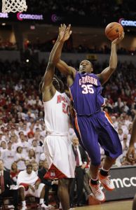 Clemson's Trevor Booker (35) goes to the basket against Maryland's Bambale Osby (50)during the first half (AP Photo)