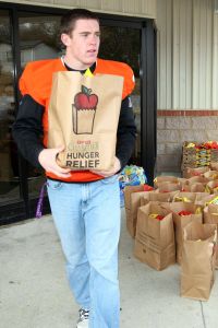 Members of the Clemson football team spent the morning of Monday, December 20 volunteering at Harvest Hope Food Bank in Greenville.