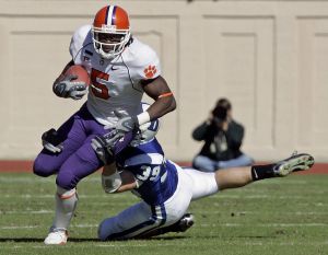Rendrick Taylor finds some running room as Duke's Adam Banks tries to tackle during the first half in Durham, N.C. (AP Photo/Gerry Broome)