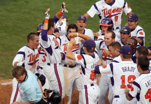 The Tigers celebrated with Jon McGibbon as he crossed the plate following his game-winning walkoff home run against Florida State on Friday in the 2012 ACC Tournament.