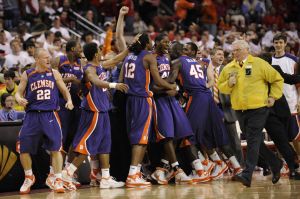 Clemson players including Terrence Oglesby (22) celebrate 73-70 win over Maryland (AP Photo)