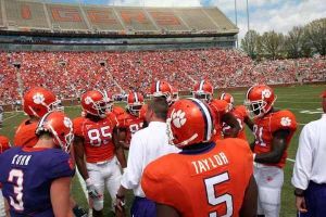 Offensive Coordinator Billy Napier pregame huddle