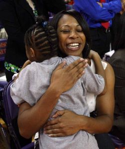 Head Coach Itoro Coleman and oldest daughter Jada pregame