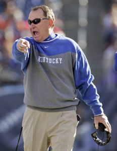 Kentucky head football coach Rich Brooks yells from the sideline as the Wildcats play Clemson in the second quarter of the Music City Bowl in Nashville, Tenn., Friday, Dec. 29, 2006. (AP Photo/Mark Humphrey)