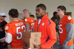 Members of the Clemson football team spent the morning of Monday, December 20 volunteering at Harvest Hope Food Bank in Greenville.