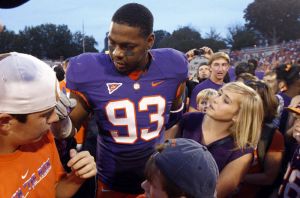 Da'Quan Bowers sign autographs postgame
