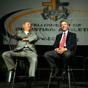 Florida State head football coach Bobby Bowden, left, and his son, Tommy, head coach at Clemson, share a laugh during their annual Fellowship of Christian Athletes Bowden Breakfast Monday, Sept. 3, 2007, at the Carolina First Center in Greenville, S.C. The FCA of Upstate South Carolina has sponsored the event each year Florida State plays at Clemson since 1999. (AP Photo/Anderson Independent-Mail, Mark Crammer)