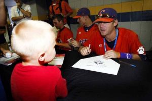 Following Friday's practice, the Tigers attended an autograph session at Rosenblatt Stadium.