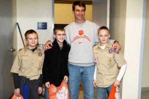 Members of the Clemson football team spent the morning of Monday, December 20 volunteering at Harvest Hope Food Bank in Greenville.