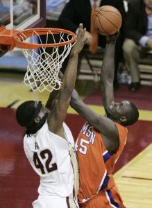 Clemson's Jerai Grant, right, is fouled by Florida State's Ryan Reid while driving to the basket in the second half of Florida State's 64-55 win in a basketball game Tuesday, Feb. 19, 2008, in Tallahassee, Fla. (AP Photo/Steve Cannon)