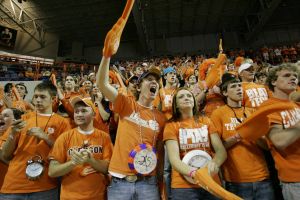 Clemson's fans wear clocks around their necks, in protest of the last time Duke played them and the time clock was altered, as they meet Duke again in a college basketball game Thursday, Feb. 22, 2007, at Littlejohn Coliseum in Clemson, S.C. (AP Photo/Mary Ann Chastain)