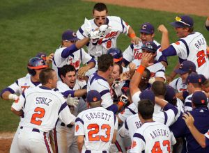 The Tigers celebrated with Jon McGibbon as he crossed the plate following his game-winning walkoff home run against Florida State on Friday in the 2012 ACC Tournament.