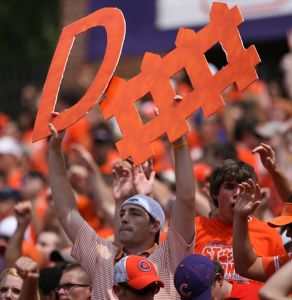 defense sign fan crowd stands 090807