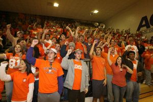 fans crowd stands cheer