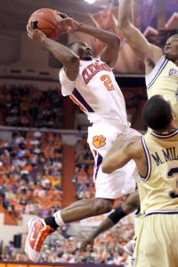Clemson's Demontez Stitt, left, shoots during the first half of an NCAA college basketball game against Georgia Tech on Tuesday, March 2, 2010 at Littlejohn Coliseum in Clemson, S.C. (AP Photo/Anderson Independent-Mail, Mark Crammer)