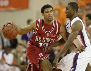 Demontez Stitt, right, defends against on North Carolina State's Marques Johnson as he brings the ball up court during the first half of their baketball game in Clemson, S.C., Tuesday, Jan. 15, 2008. (AP Photo/Patrick Collard)