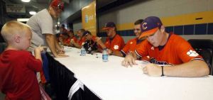Following Friday's practice, the Tigers attended an autograph session at Rosenblatt Stadium.