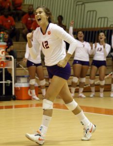 Kristin Faust celebrates one of her three aces.