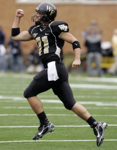 Wake Forest quarterback Riley Skinner reacts after his touchdown catch against Clemson during a college football game in Winston-Salem, N.C., Saturday, Oct. 7, 2006. (AP Photo/Chuck Burton)