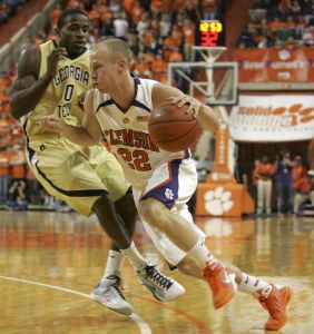 Terrence Oglesby drives for the basket as Lewis Clinch defends during the first half.