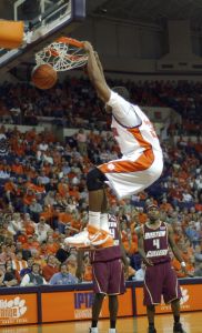 Clemson's Sam Perry dunks as Boston College's Tyrelle Blair (44) and Tyrese Rise (4) look on during the second half of a college basketball game Saturday, Jan. 20, 2007, in Clemson, S.C. Clemson defeated Boston College 74-54. (AP Photo/Emily Horos)