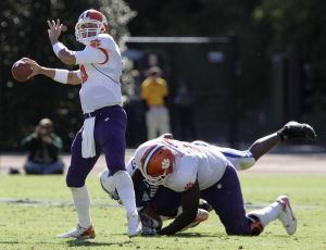 Cullen Harper passes against Duke during the first half. Harper threw two touchdowns and ran for another, and No. 25 Clemson scored 16 points in a 39-second span of its 47-10 rout of Duke on Saturday. (AP Photo/Gerry Broome)