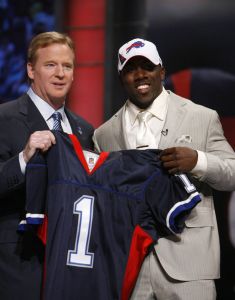 Clemson running back C.J. Spiller, right, holds up a jersey with NFL commissioner Roger Goodel after he was selected as the ninth overall pick by the Buffalo Bills in the first round of the NFL football draft at Radio City Music Hall Thursday, April 22, 2010, in New York. (AP Photo/Jason DeCrow)
