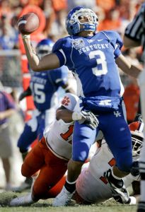 Kentucky quarterback Andre' Woodson (3) is sacked by Clemson defensive back C. J. Gaddis (12) in the second quarter of the Music City Bowl college football game in Nashville, Tenn., Friday, Dec. 29, 2006. (AP Photo/Mark Humphrey)