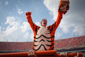 President James Barker wore the Tiger mascot suit and did pushups following a Clemson touchdown in the third quarter against Furman.