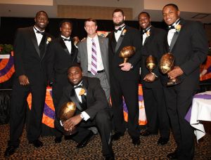 2012 Permanent Captains: Jaron Brown, Andre Ellington, Jonathan Meeks, Dalton Freeman, Rashard Hall and Xavier Brewer with Head Coach Dabo Swinney 