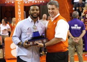Athletic Director Dan Radakovich presents the Chick-fil-A Bowl MVP trophy to quarterback Tajh Boyd.