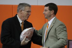 Head Coach Dabo Swinney presented a football to former Athletic Director Terry Don Phillips commemorating the completion of the facility and the Tigers? Chick-fil-A Bowl win over LSU.