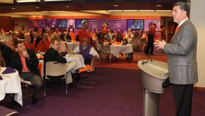 Director of Athletics Dan Radakovich speaks to guests at a special event at the West End Zone on National Signing Day.