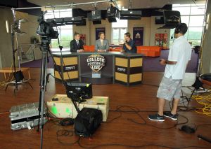 The ESPN College Football Live set with Chris Fowler, Kirk Herbstreit and Dabo Swinney