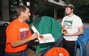 The IPTAY Collegiate Club members are waiting in line for tickets to the Clemson-Georgia football game, which will be distributed beginning Monday morning.
