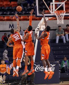K.J. McDaniels, Jaron Blosssomgame and Landry Nnoko
