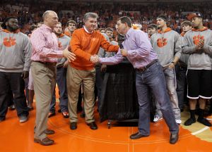 Clemson President James P. Clements and Director of Athletics Dan Radakovich presented the 2014 Orange Bowl trophy to Head Coach Dabo Swinney at halftime of the game.